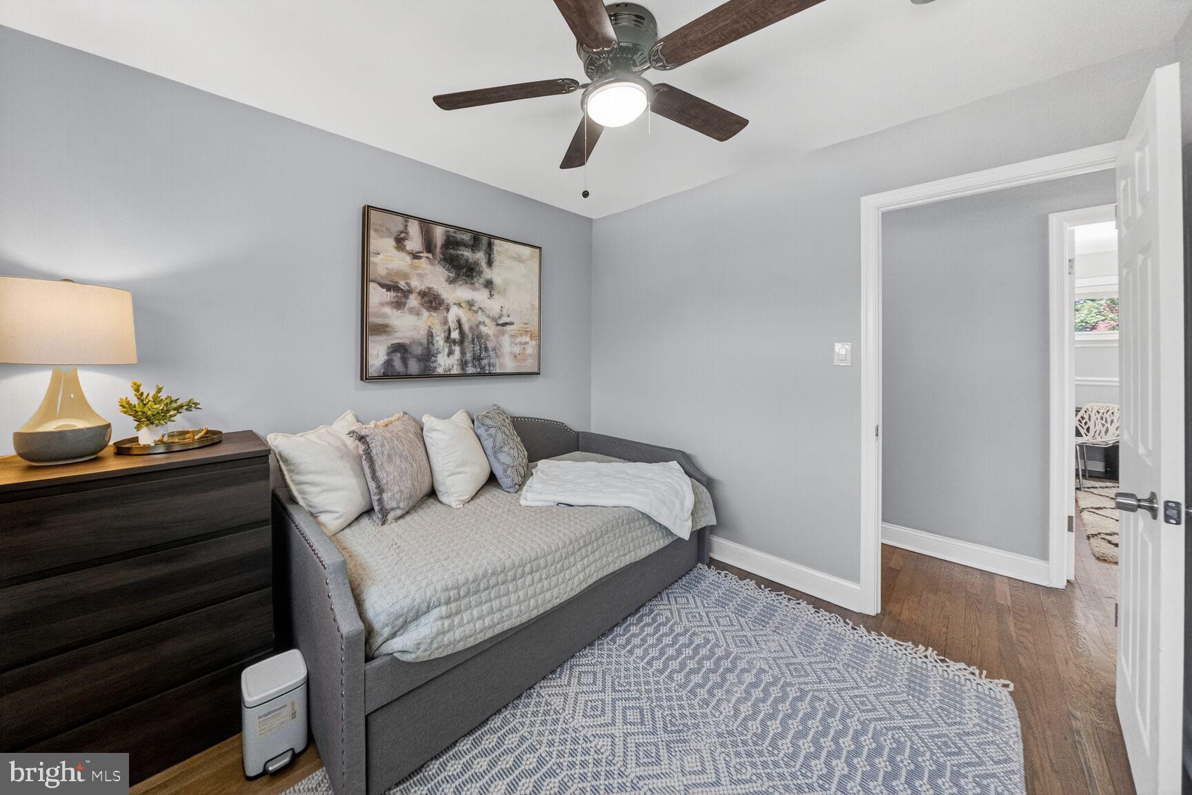 7007 Lemay Road Rockville, MD 20851 - Photo 24 of 37 a bed room with a bed and a walk in closet