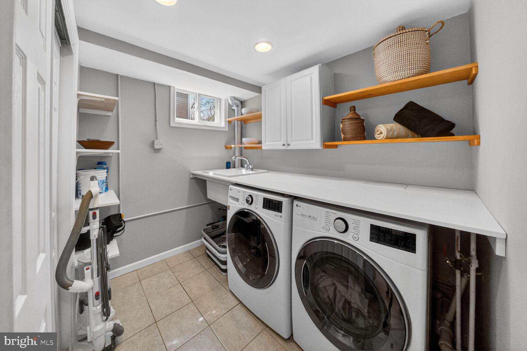 7007 Lemay Road Rockville, MD 20851 - Photo 31 of 37 a utility room with dryer and washer