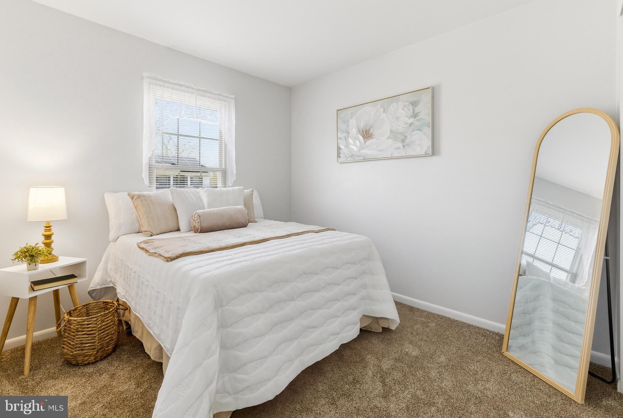 119 Robins Run West Swedesboro, NJ 08085 - Photo 14 of 20 a bedroom with a bed and a window