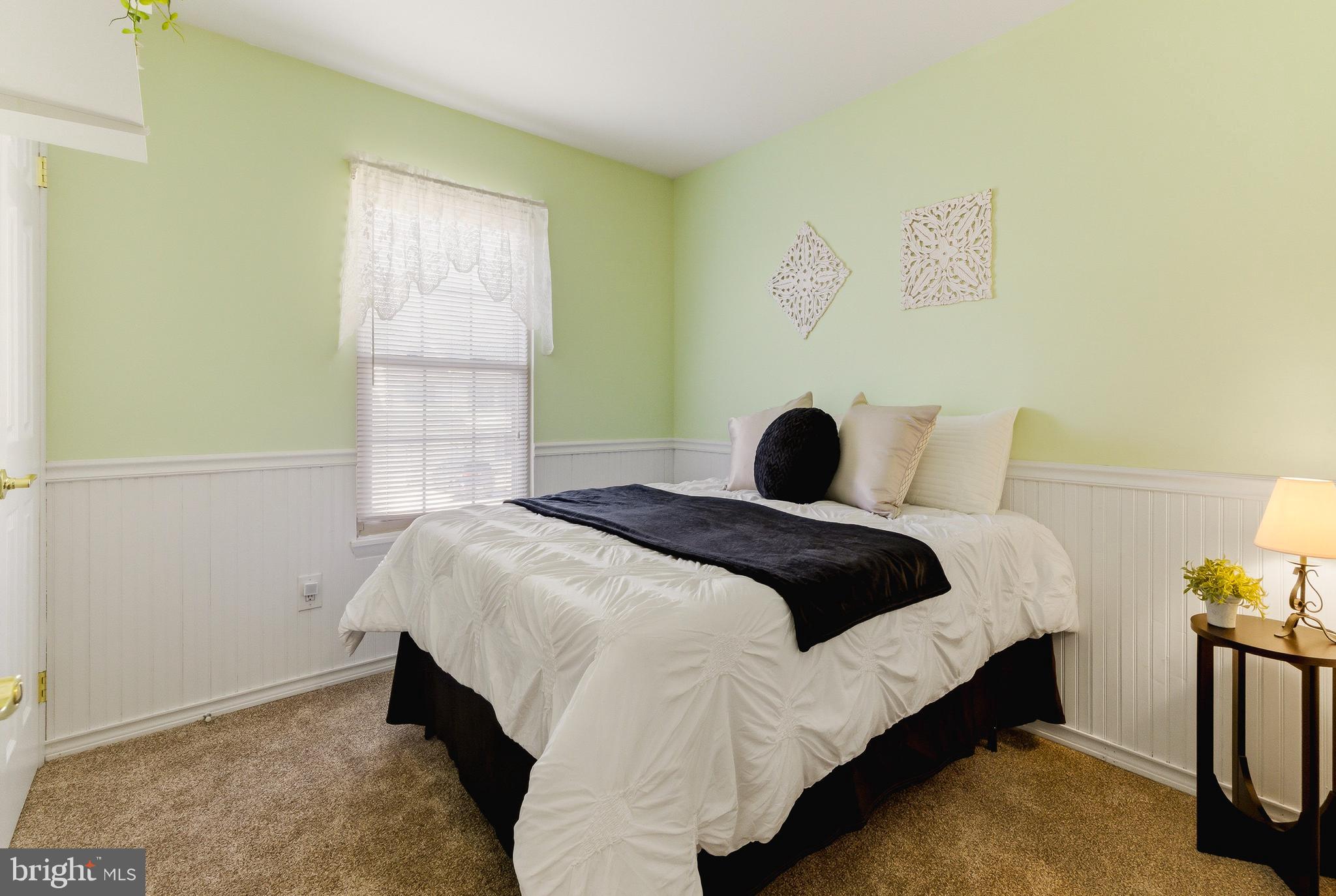 119 Robins Run West Swedesboro, NJ 08085 - Photo 18 of 20 a bedroom with a bed and a window