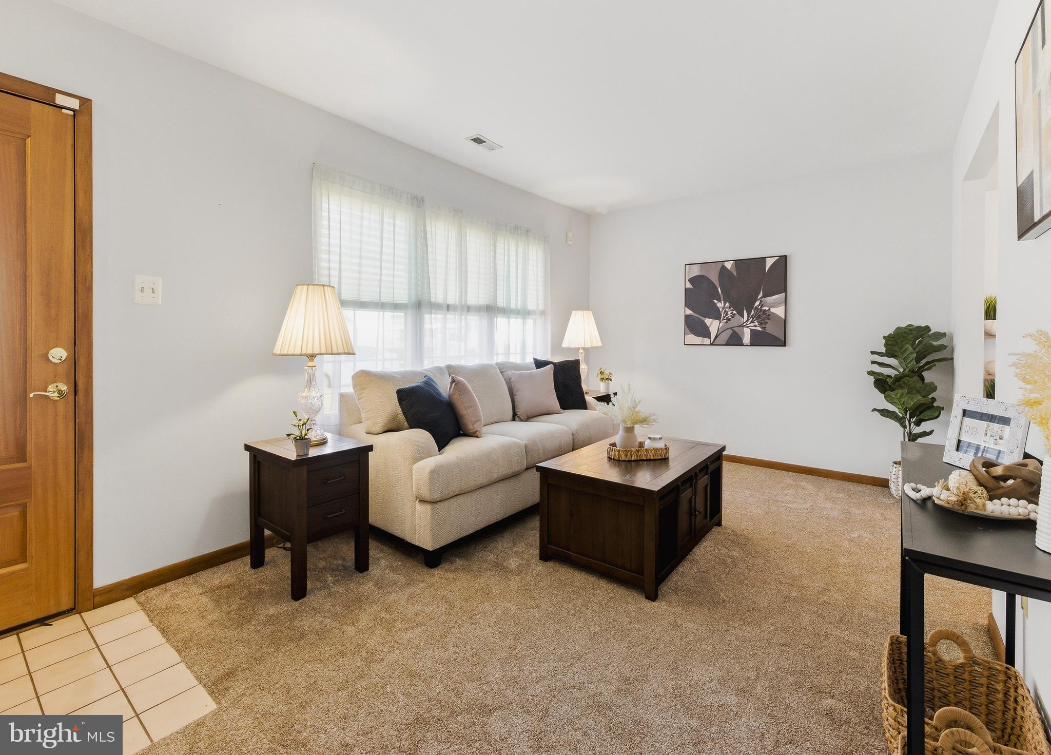 119 Robins Run West Swedesboro, NJ 08085 - Photo 3 of 20 a living room with furniture and a window