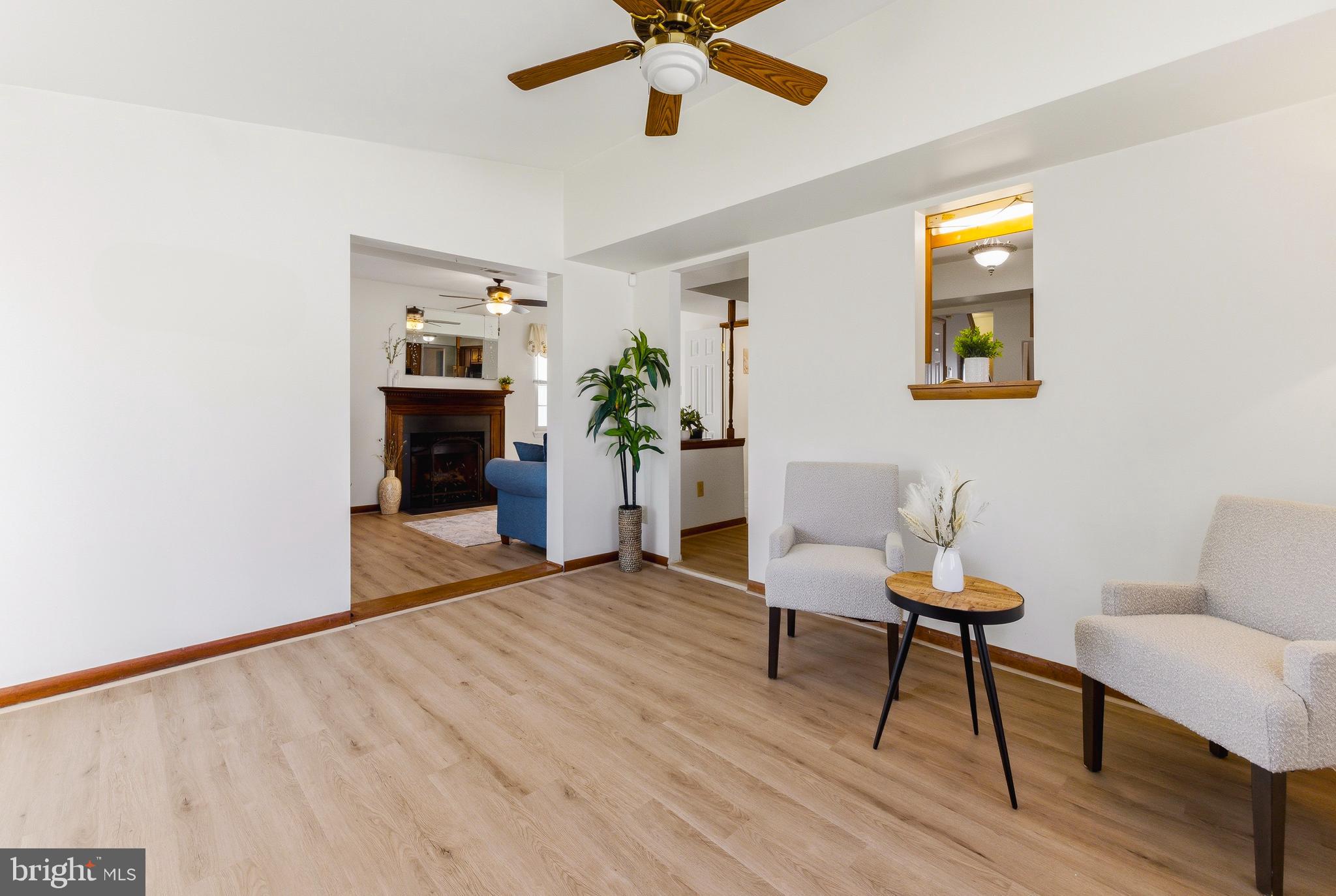 119 Robins Run West Swedesboro, NJ 08085 - Photo 10 of 20 a living room with furniture and a wooden floor