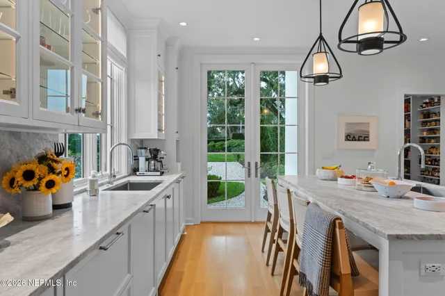 a view of a dining room with furniture and window