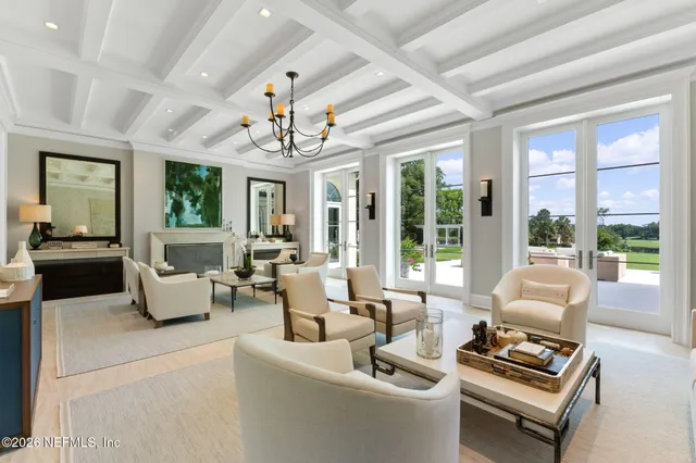 a spacious bedroom with a bed and window