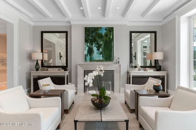 a white bath tub sitting next to a white sink