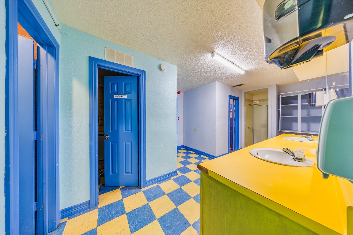 4227 Old Chocolate Bayou Road Manvel, TX 77578 - Photo 27 of 45 a bedroom with a bed and a dresser