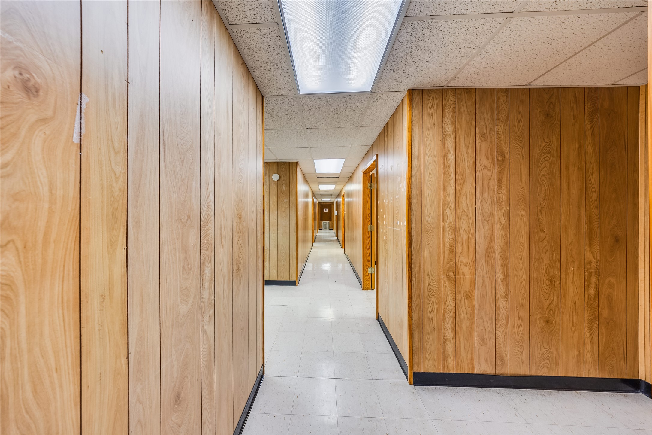 4227 Old Chocolate Bayou Road Manvel, TX 77578 - Photo 39 of 45 a view of a hallway with wooden shelves