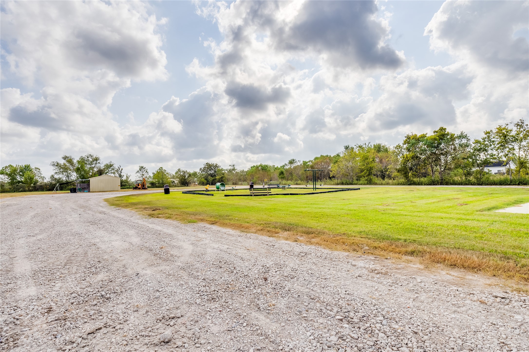 4227 Old Chocolate Bayou Road Manvel, TX 77578 - Photo 9 of 45 a view of an swimming pool and a yard
