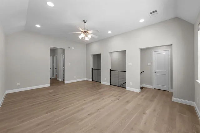 a bathroom with a shower toilet and sink