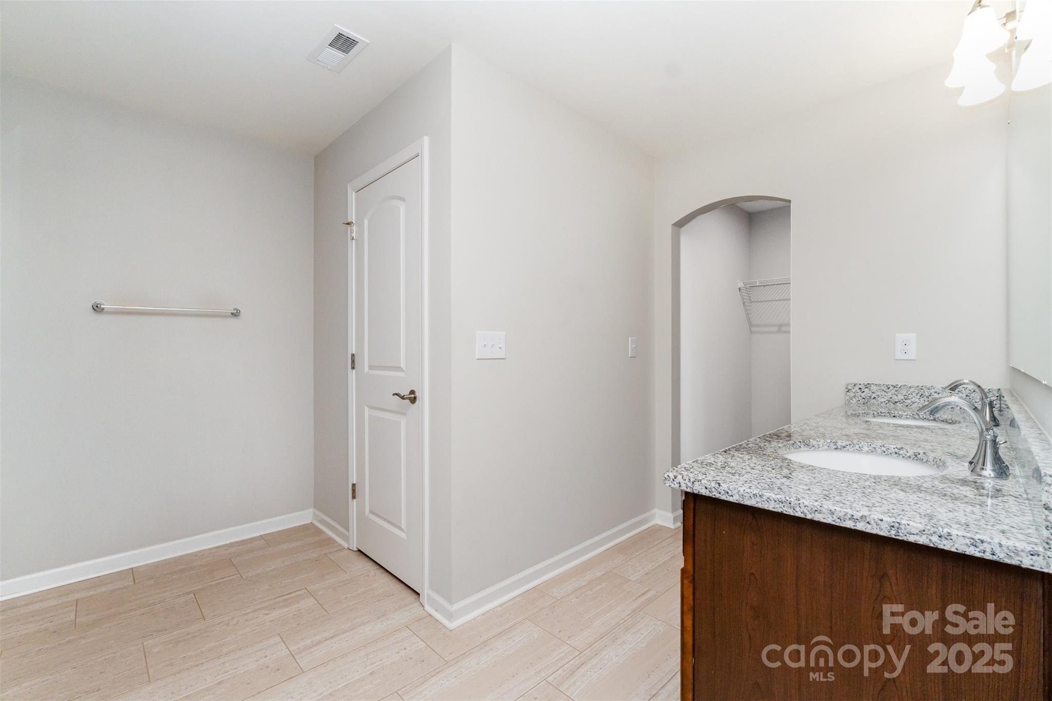 423 Crisfield Court York, SC 29745 - Photo 24 of 45 a bathroom with a sink and a mirror