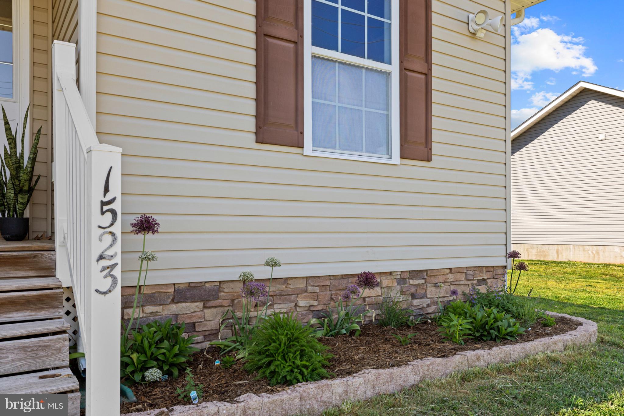 1523 Bowie Road Colonial Beach, VA 22443 - Photo 27 of 34 a side view of a house with a yard