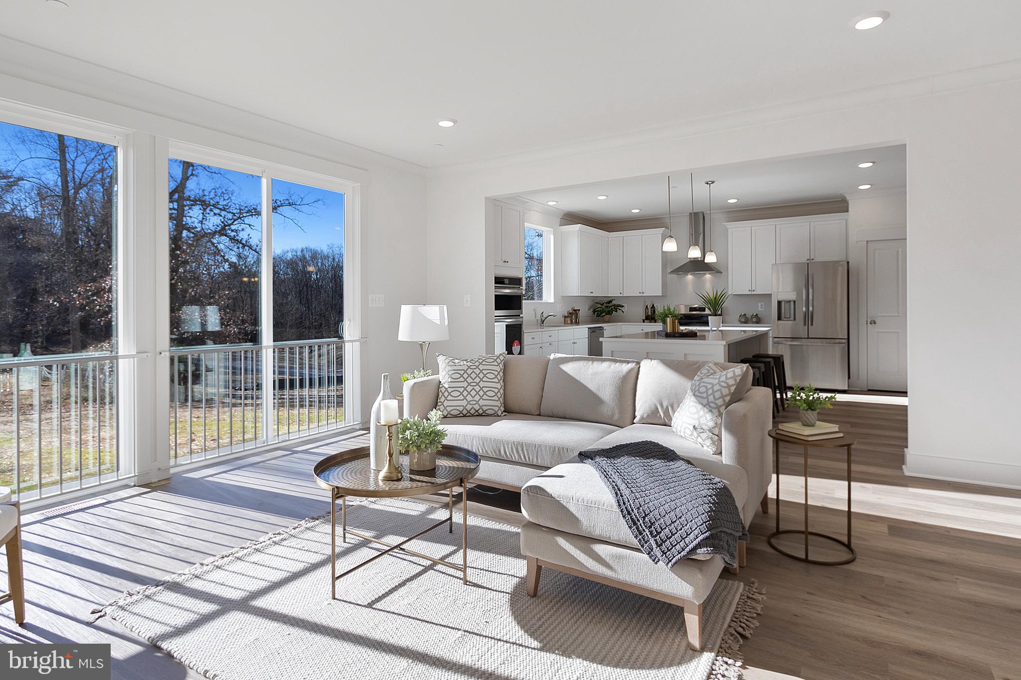 1333 German Driveway Hanover, MD 21076 - Photo 18 of 56 a living room with furniture and a large window