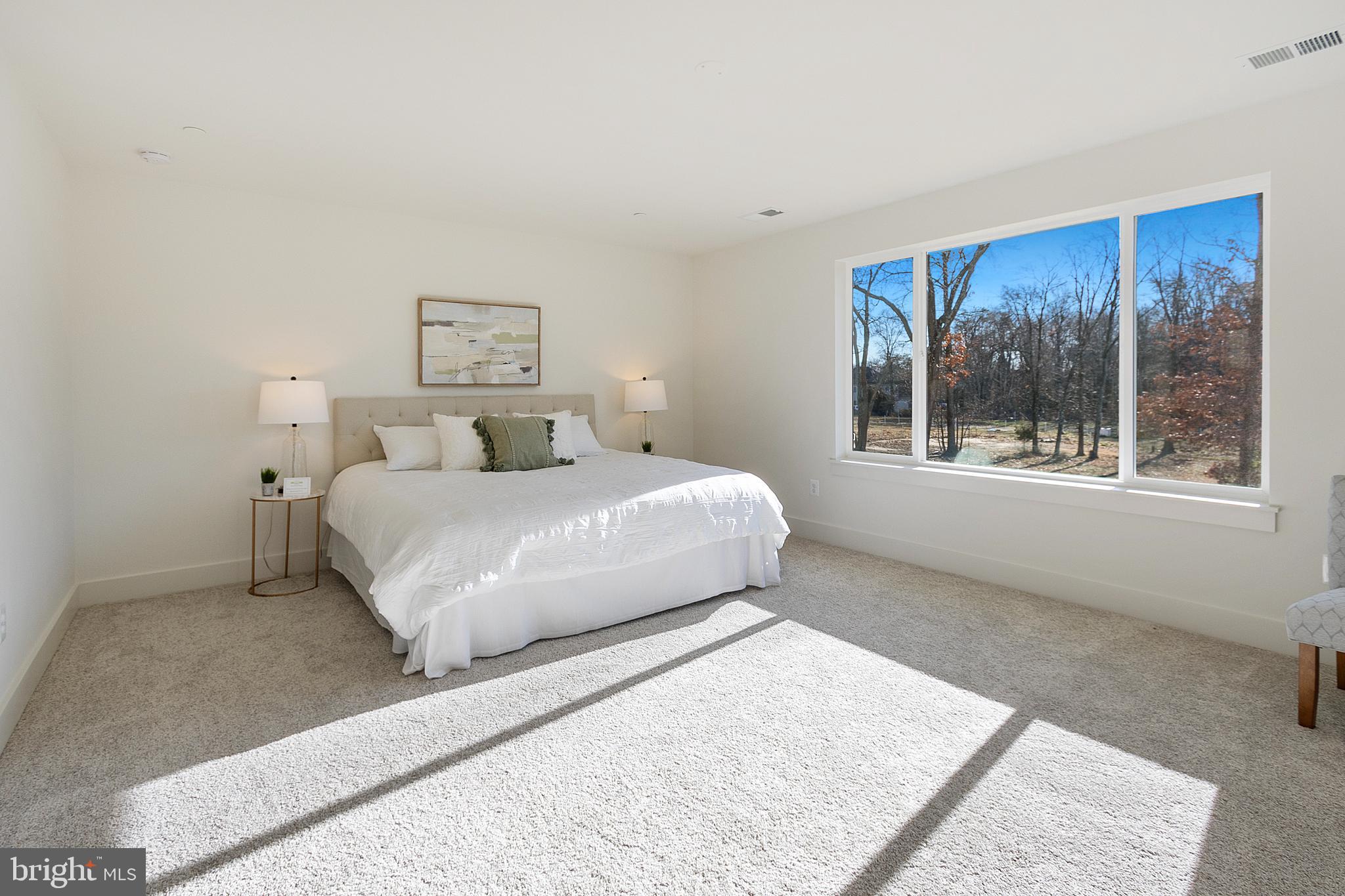 1333 German Driveway Hanover, MD 21076 - Photo 25 of 56 a bedroom with a large bed and a window