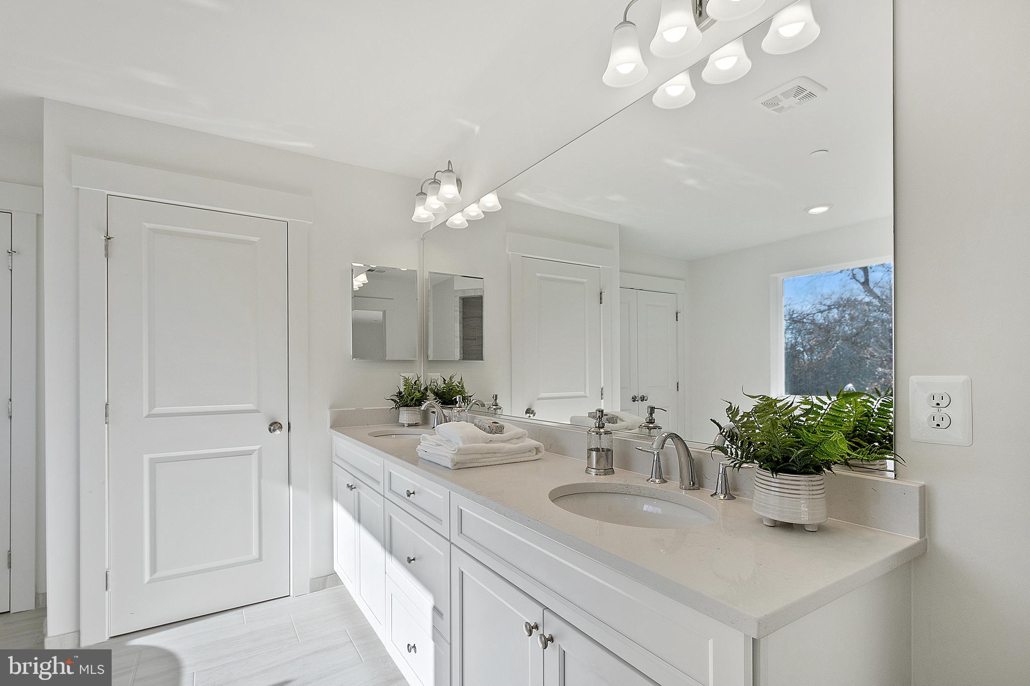 1333 German Driveway Hanover, MD 21076 - Photo 28 of 56 a bathroom with a sink vanity and a mirror