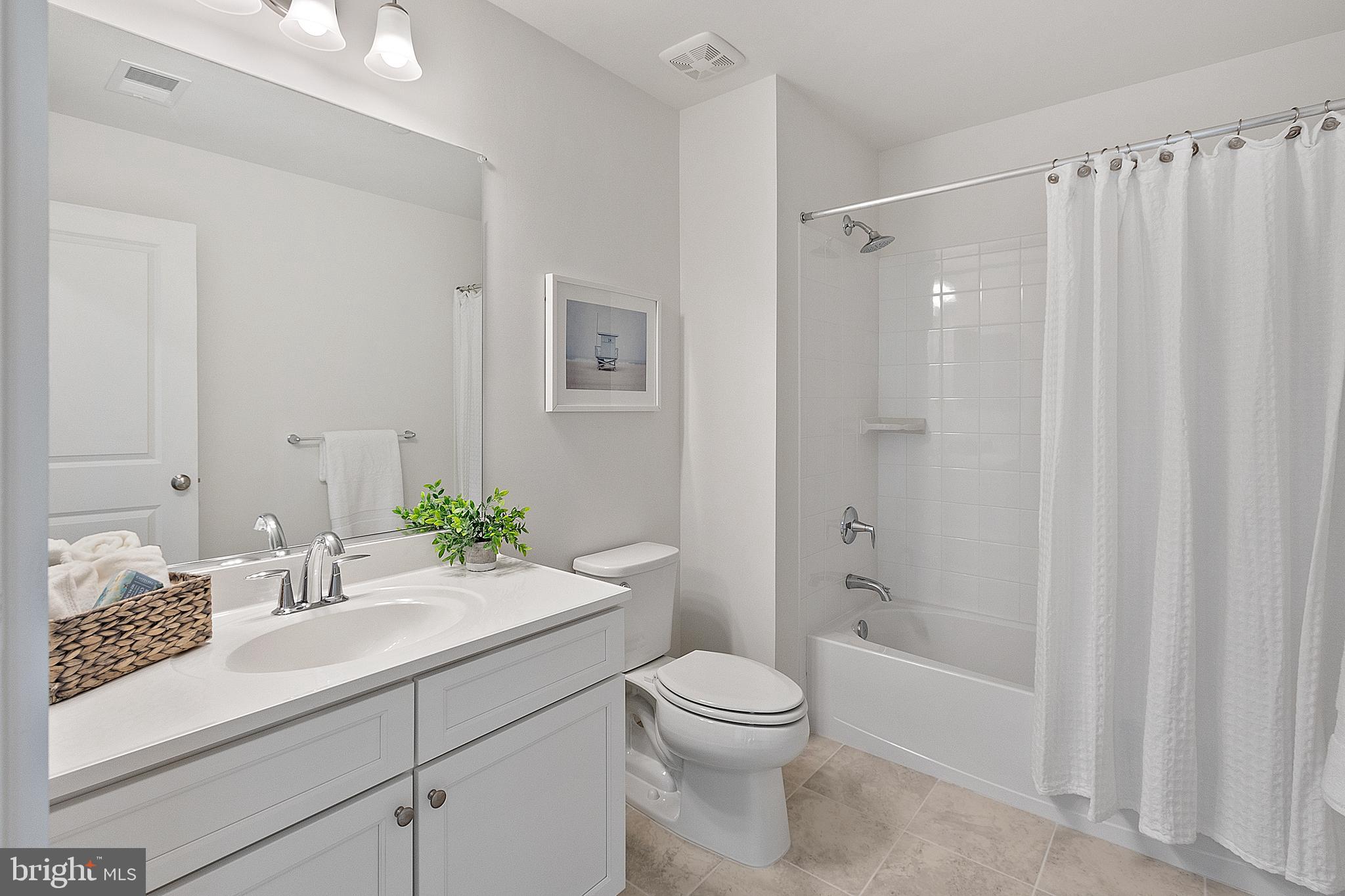 1333 German Driveway Hanover, MD 21076 - Photo 32 of 56 a bathroom with a sink a toilet and shower