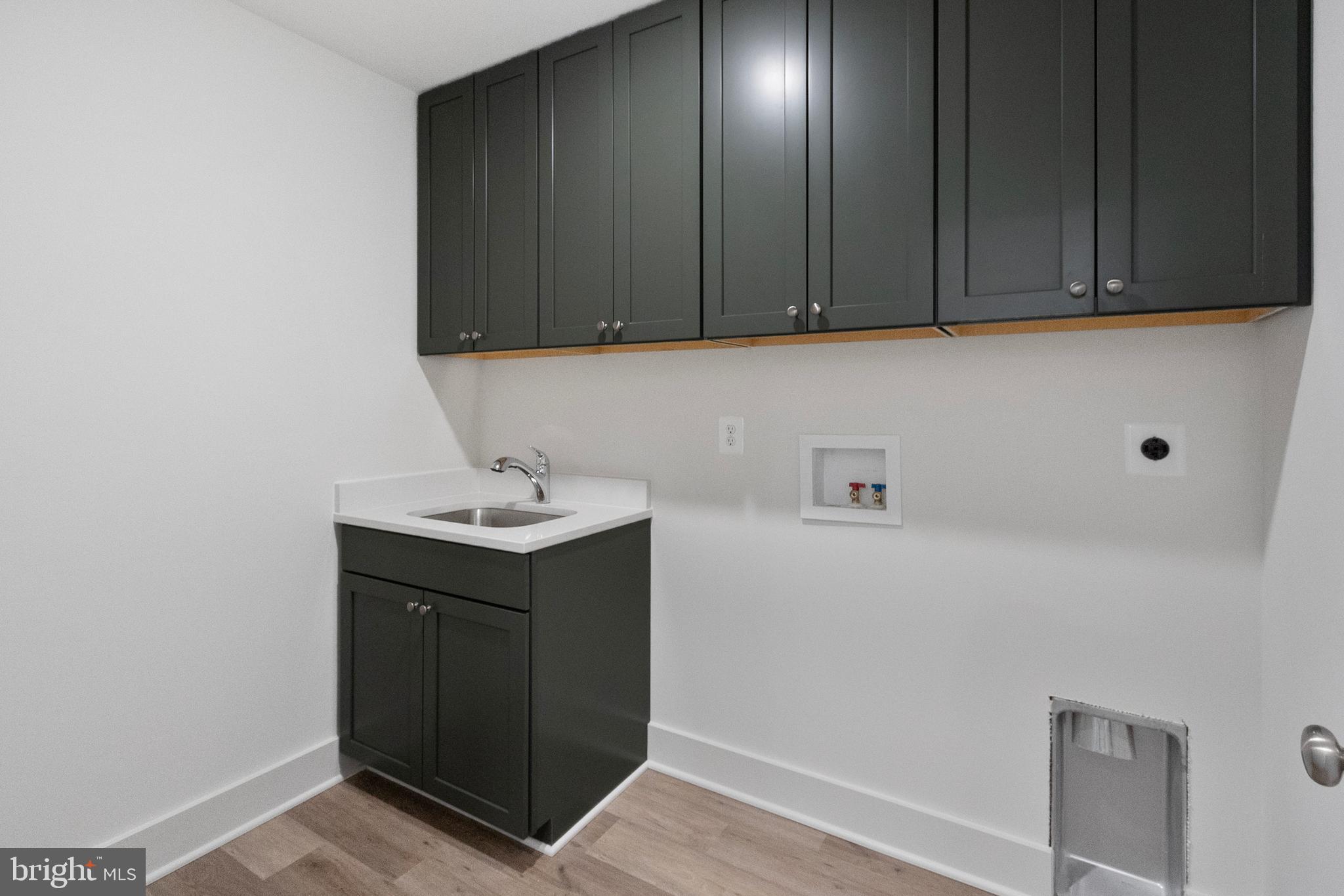 1333 German Driveway Hanover, MD 21076 - Photo 34 of 56 a room with a sink cabinets and utility room