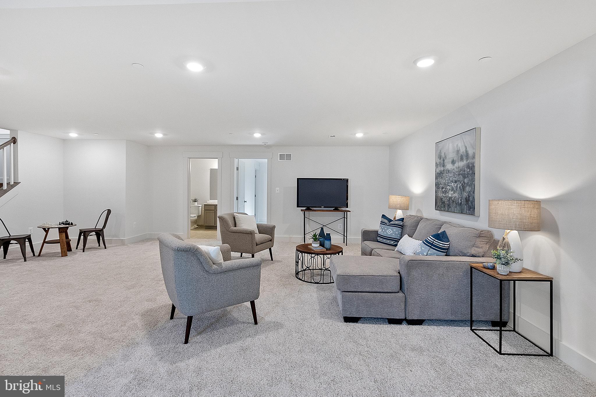 1333 German Driveway Hanover, MD 21076 - Photo 41 of 56 a living room with furniture and a flat screen tv