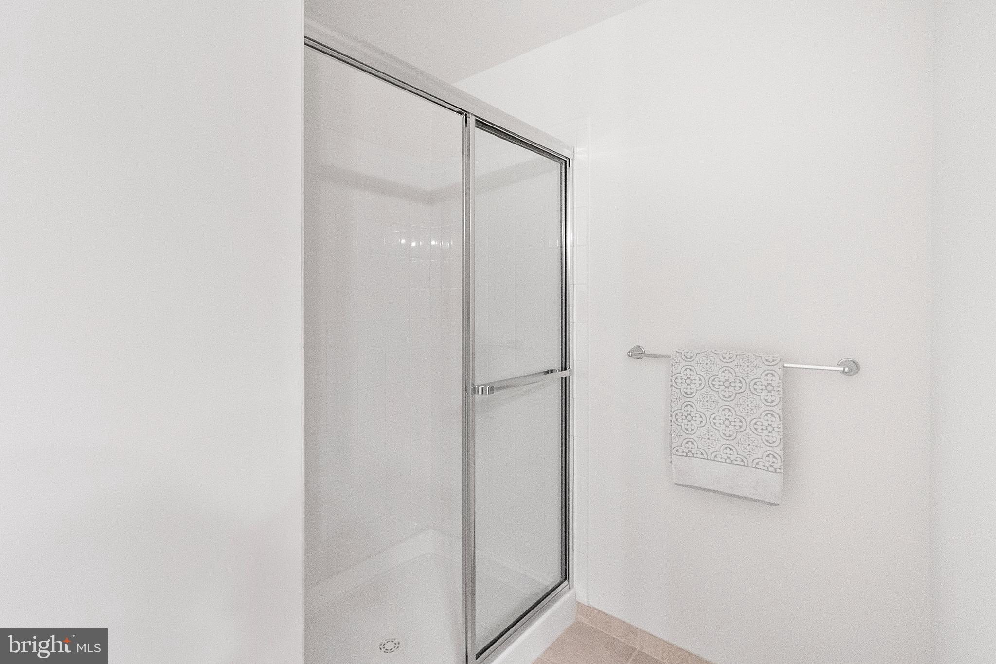 1333 German Driveway Hanover, MD 21076 - Photo 44 of 56 a bathroom with a glass shower door