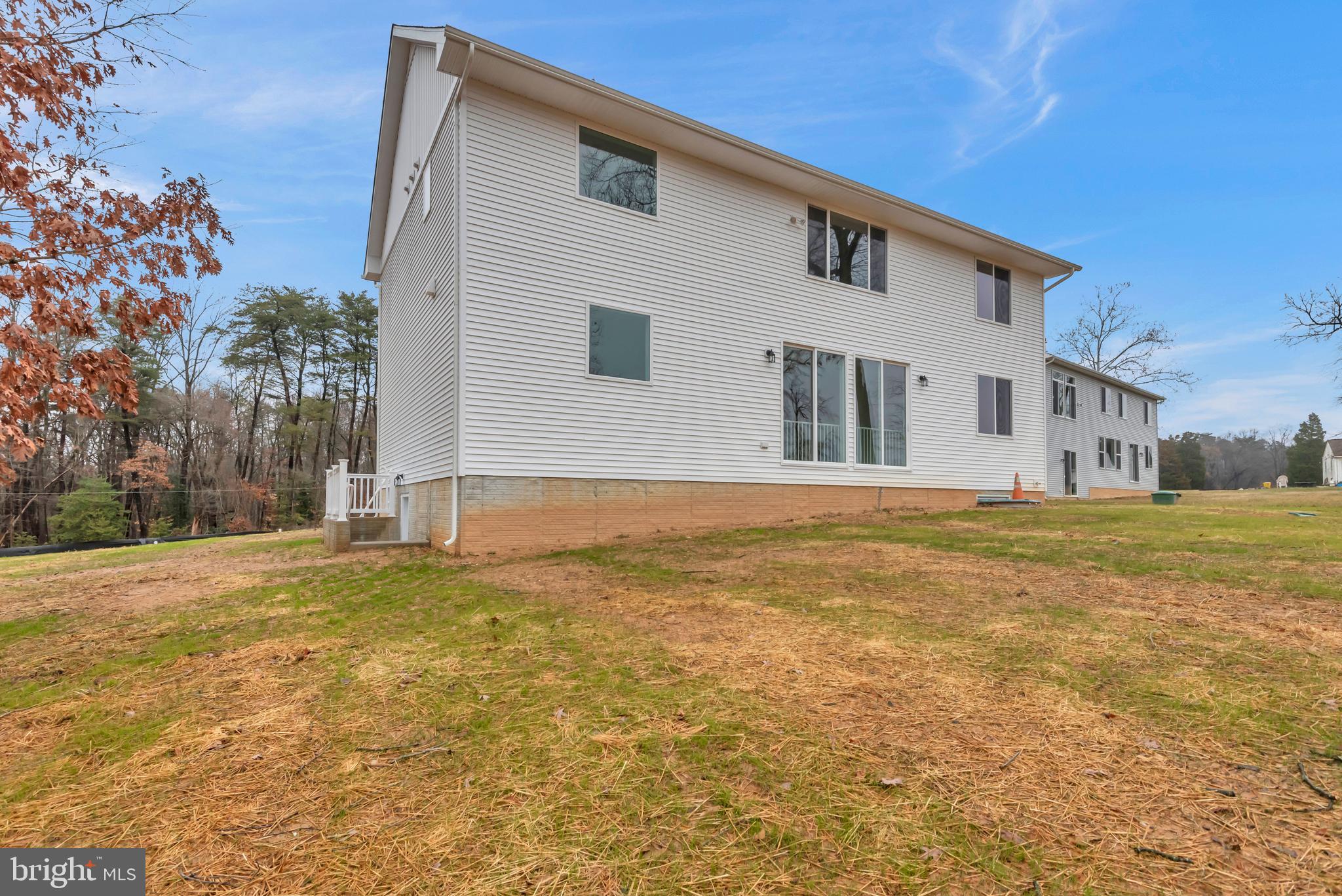 1333 German Driveway Hanover, MD 21076 - Photo 49 of 56 a front view of a house with a yard