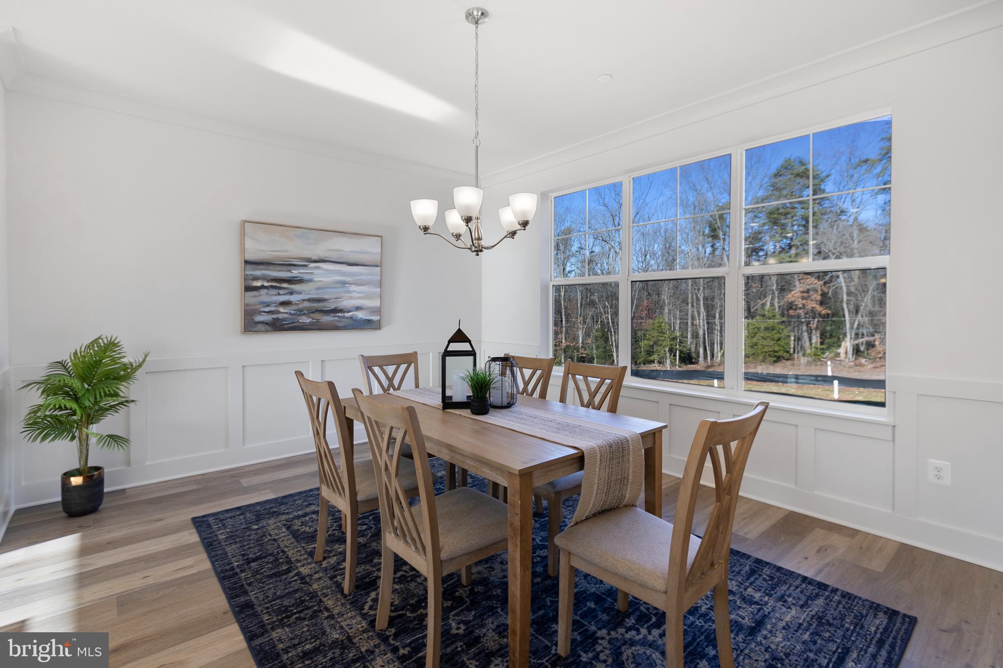 1333 German Driveway Hanover, MD 21076 - Photo 9 of 56 a view of a dining room with furniture window and wooden floor