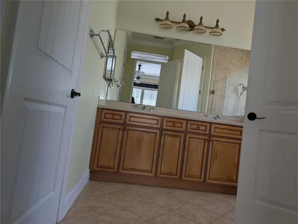 a view of a front door with a mirror