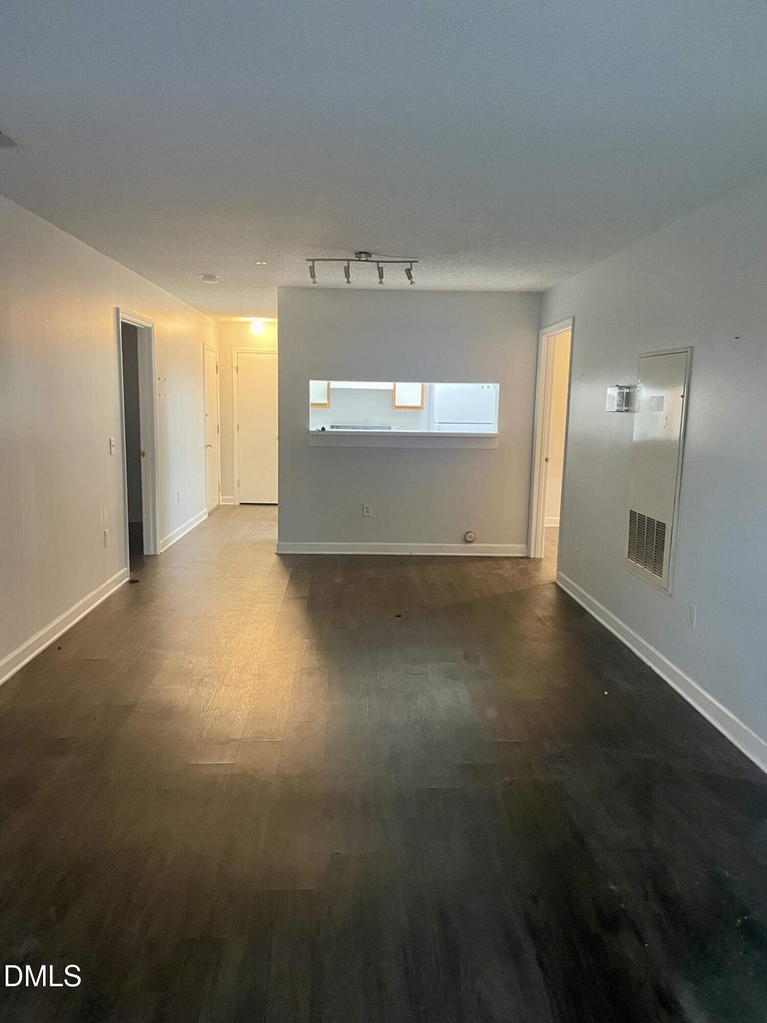 303 Smith Level Road, Unit C12 Chapel Hill, NC 27516 - Photo 2 of 18 a view of a livingroom with wooden floor