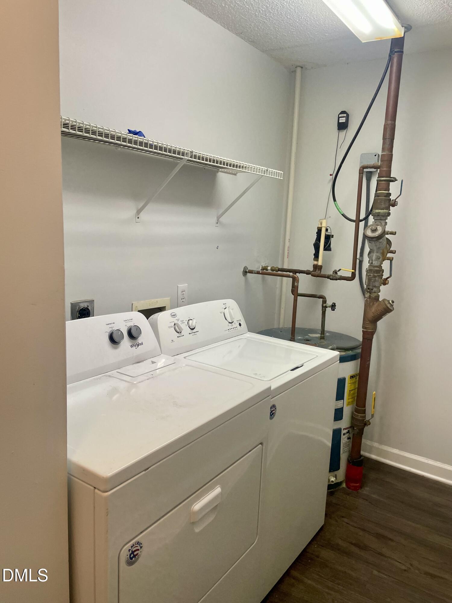 303 Smith Level Road, Unit C12 Chapel Hill, NC 27516 - Photo 5 of 18 a utility room with dryer and washer
