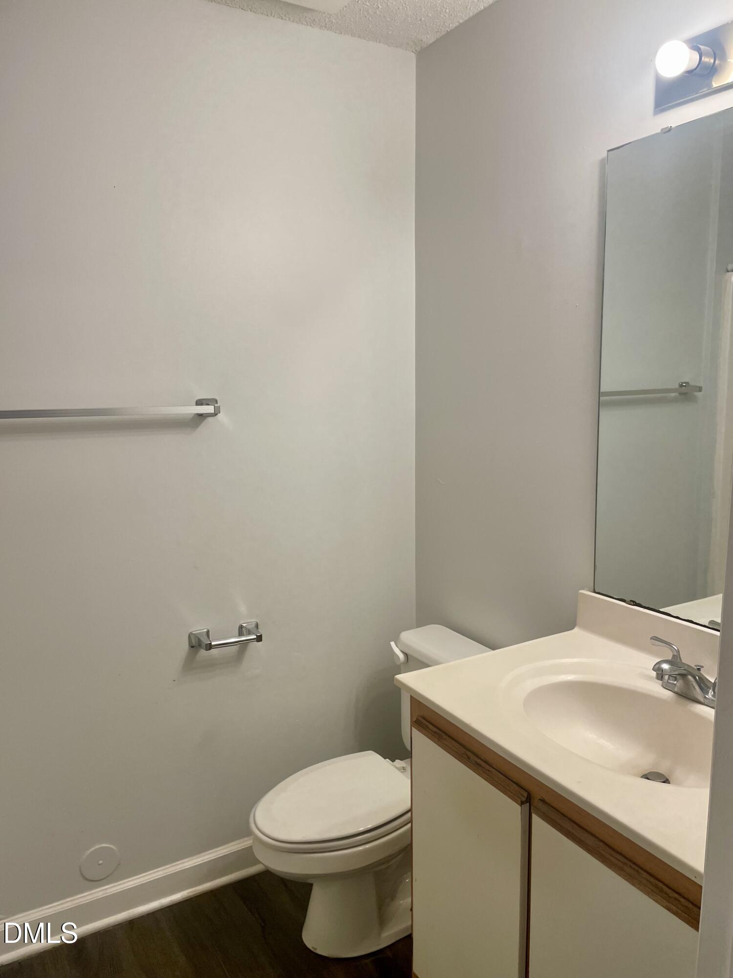 303 Smith Level Road, Unit C12 Chapel Hill, NC 27516 - Photo 8 of 18 a bathroom with a sink and toilet