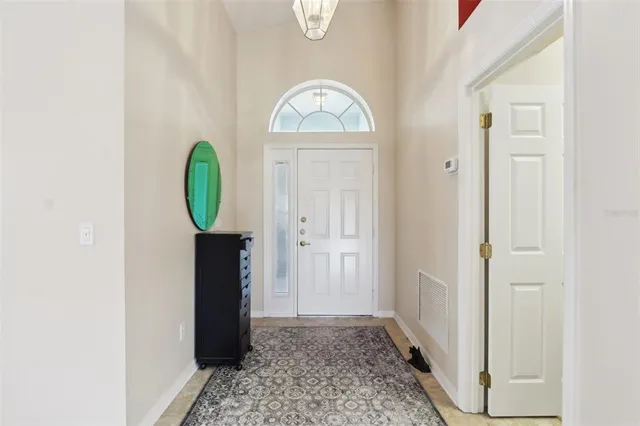 a view of entryway with wooden floor