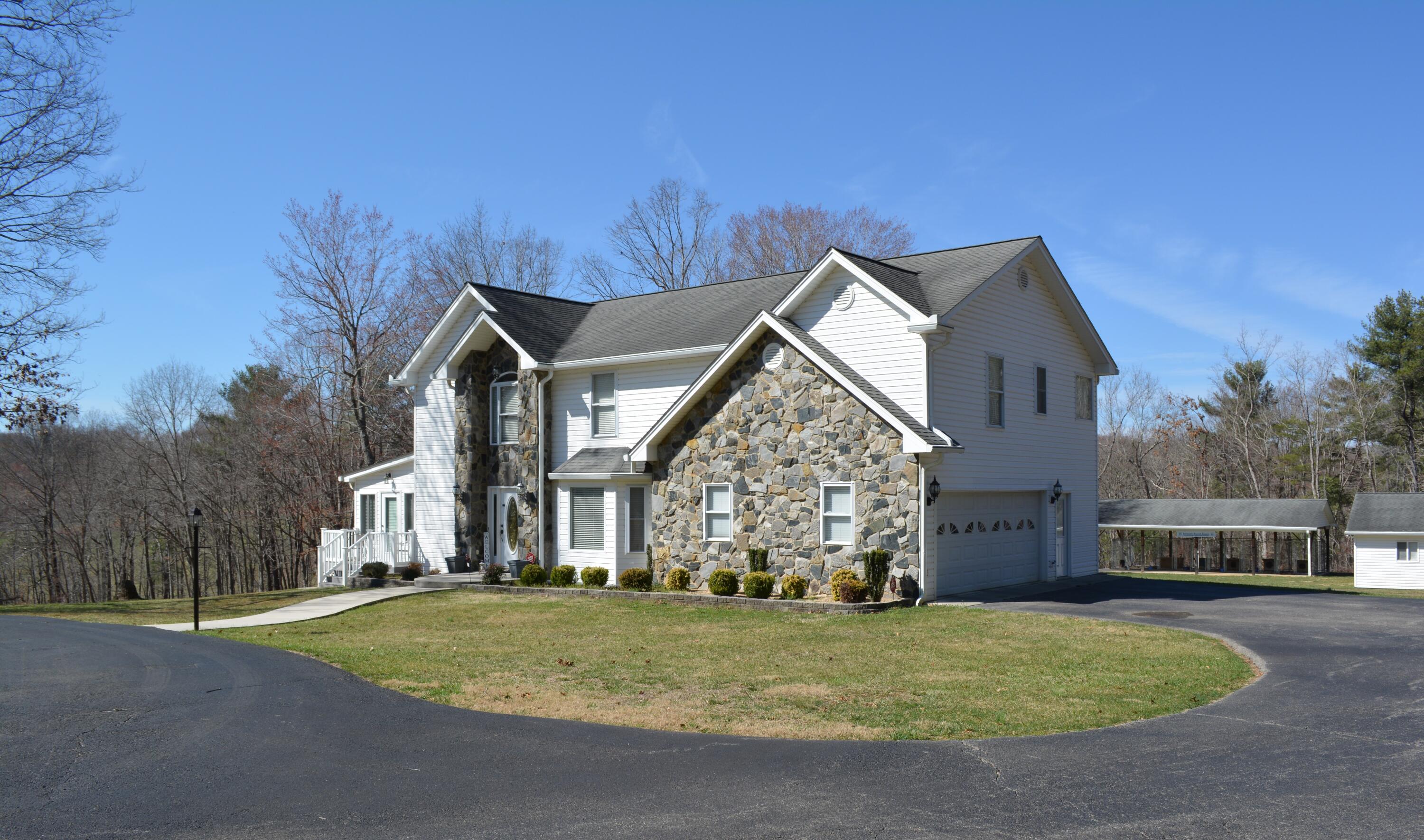 935 Adam Perry Road Rocky Mount, VA 24151 - Photo 3 of 24 a view of house and outdoor space