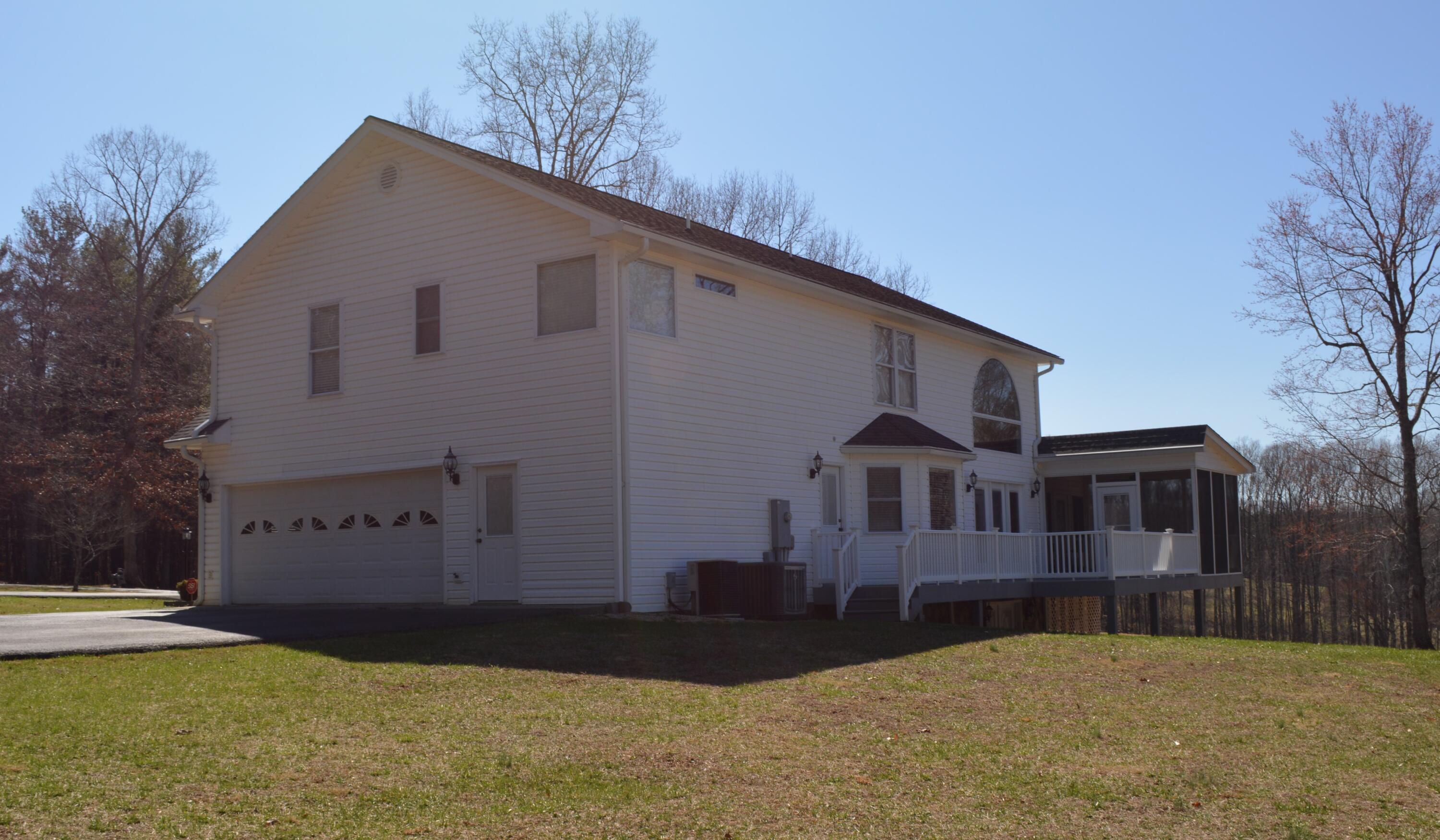 935 Adam Perry Road Rocky Mount, VA 24151 - Photo 6 of 24 a view of a house with a yard