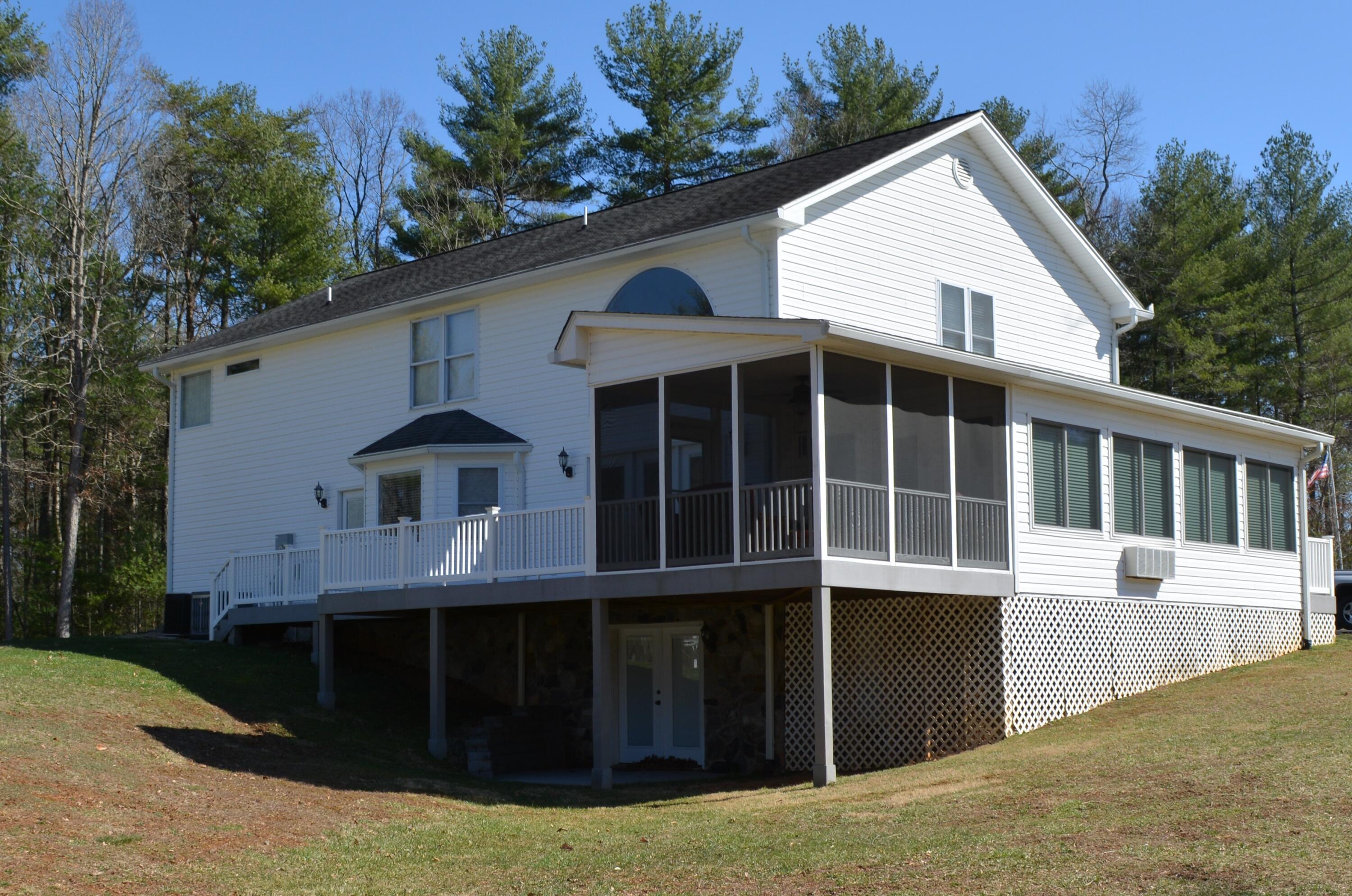935 Adam Perry Road Rocky Mount, VA 24151 - Photo 8 of 24 a view of house with yard