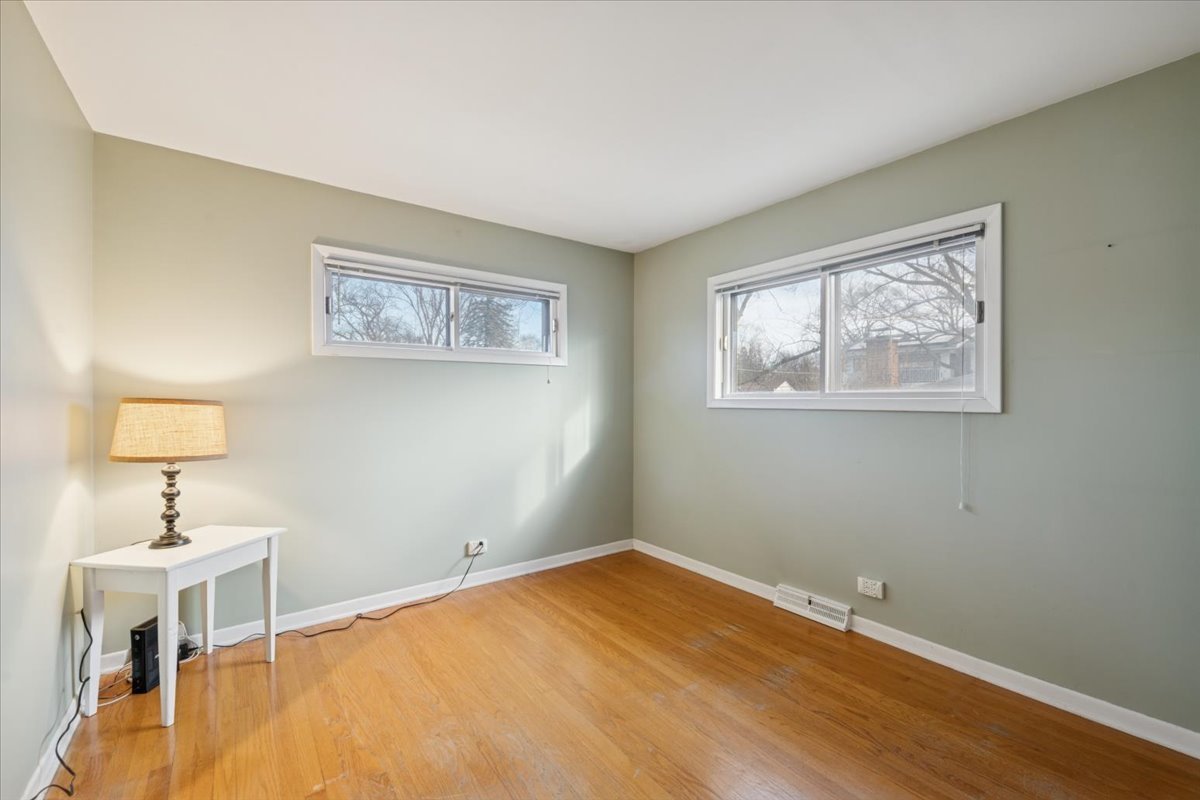 1814 Illinois Road Northbrook, IL 60062 - Photo 12 of 36 a view of a room with wooden floor