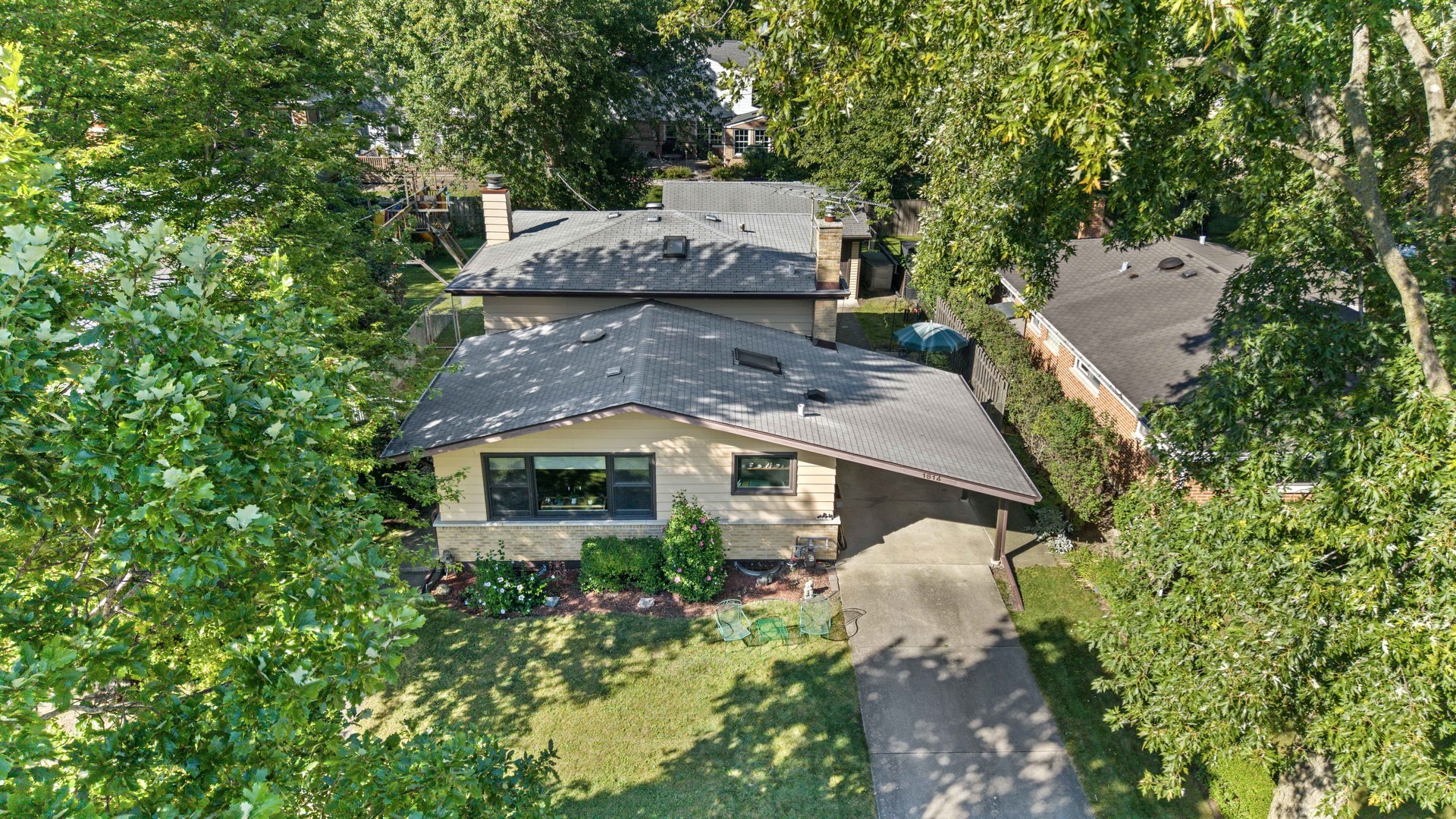 1814 Illinois Road Northbrook, IL 60062 - Photo 29 of 36 an aerial view of a house with a yard and garden