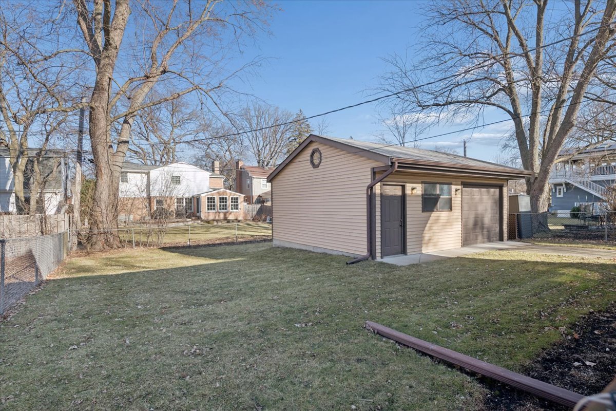 1814 Illinois Road Northbrook, IL 60062 - Photo 31 of 36 a view of a house with backyard and tree