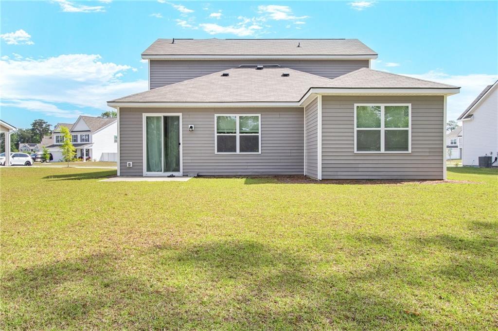 301 Merganser Drive Pooler, GA 31322 - Photo 17 of 18 a view of a house with a swimming pool
