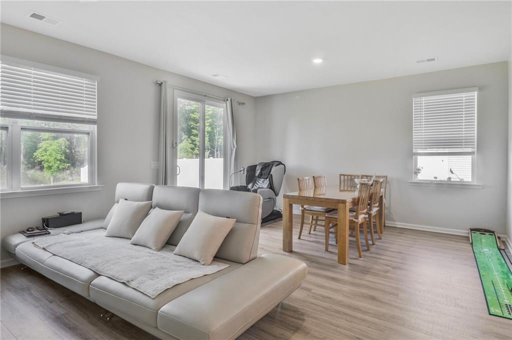301 Merganser Drive Pooler, GA 31322 - Photo 2 of 18 a living room with furniture and a window