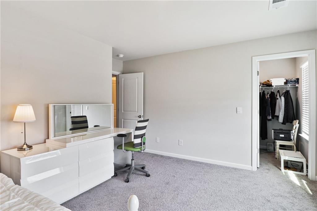 301 Merganser Drive Pooler, GA 31322 - Photo 6 of 18 a view of a livingroom with a flat screen tv