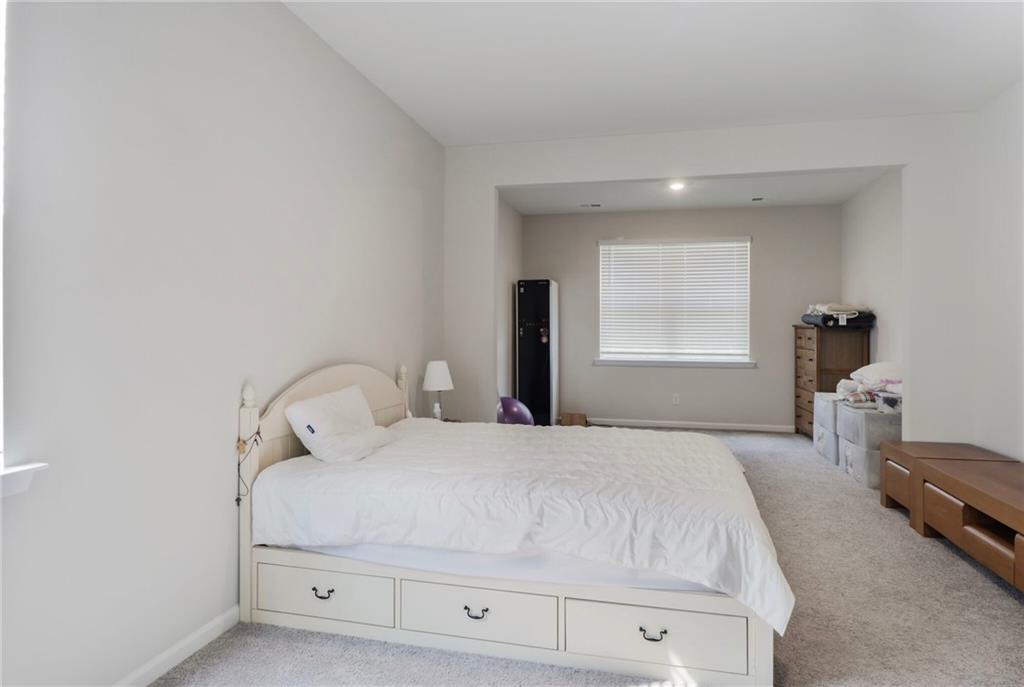 301 Merganser Drive Pooler, GA 31322 - Photo 7 of 18 a bedroom with a bed and a dresser