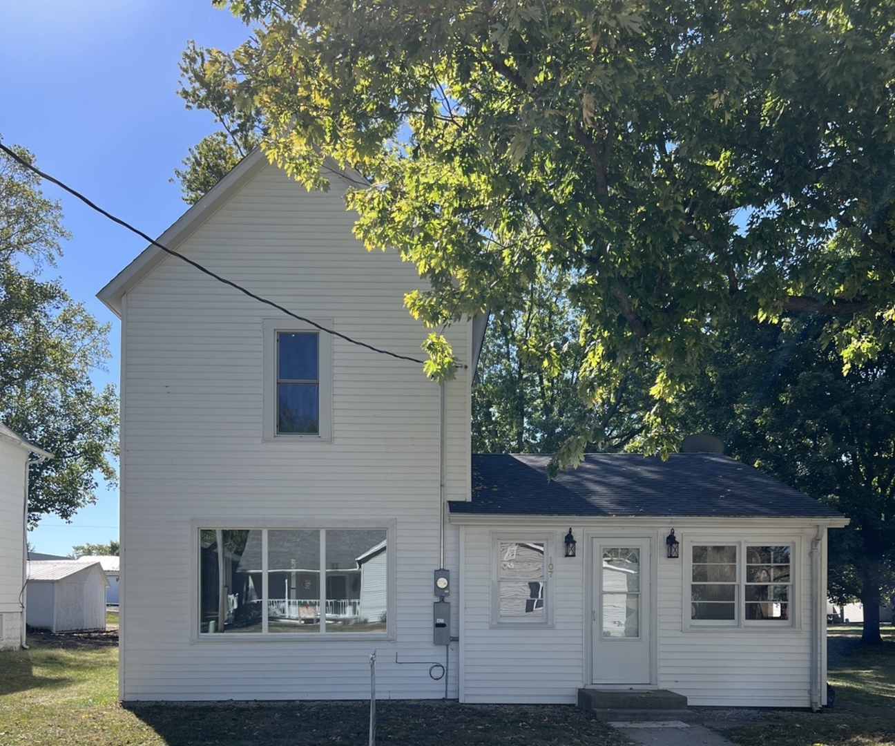 a backyard of a house with lots of green space