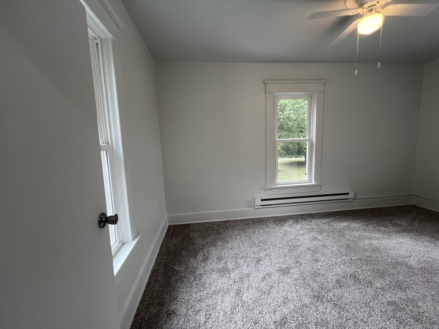 107 West Weldon Street Roberts, IL 60962 - Photo 17 of 21 an empty room with windows