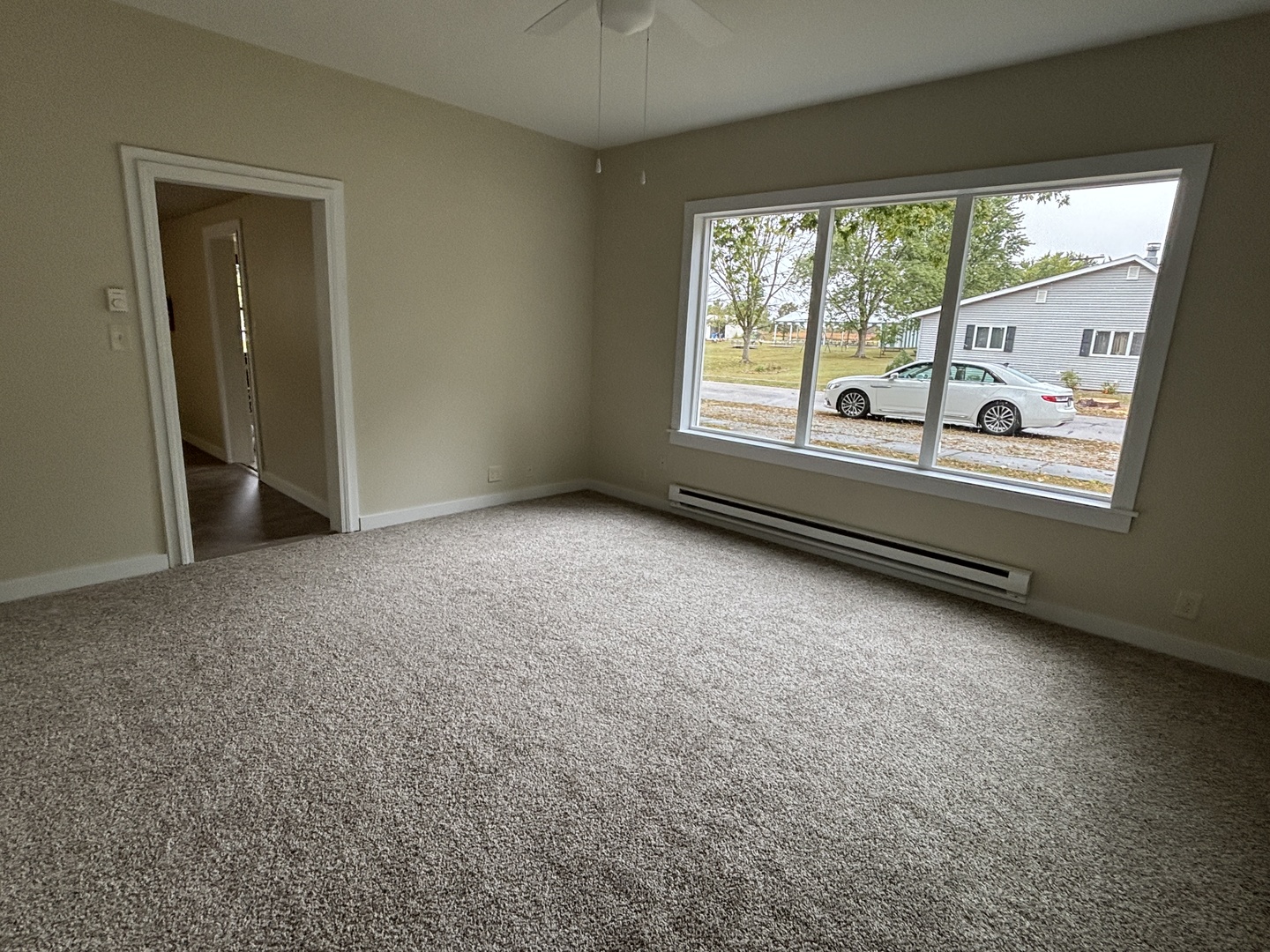 107 West Weldon Street Roberts, IL 60962 - Photo 6 of 21 an empty room with windows and view