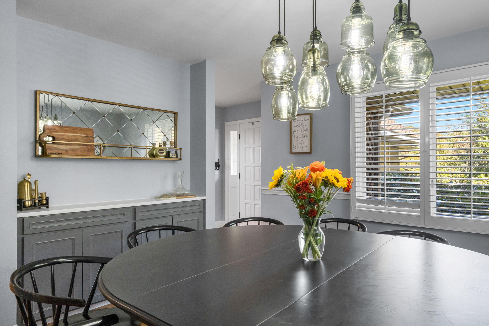 2 Dogwood Road, Unit 2 Buzzards Bay, MA 02532 - Photo 16 of 49 a view of a dining room with furniture and a chandelier