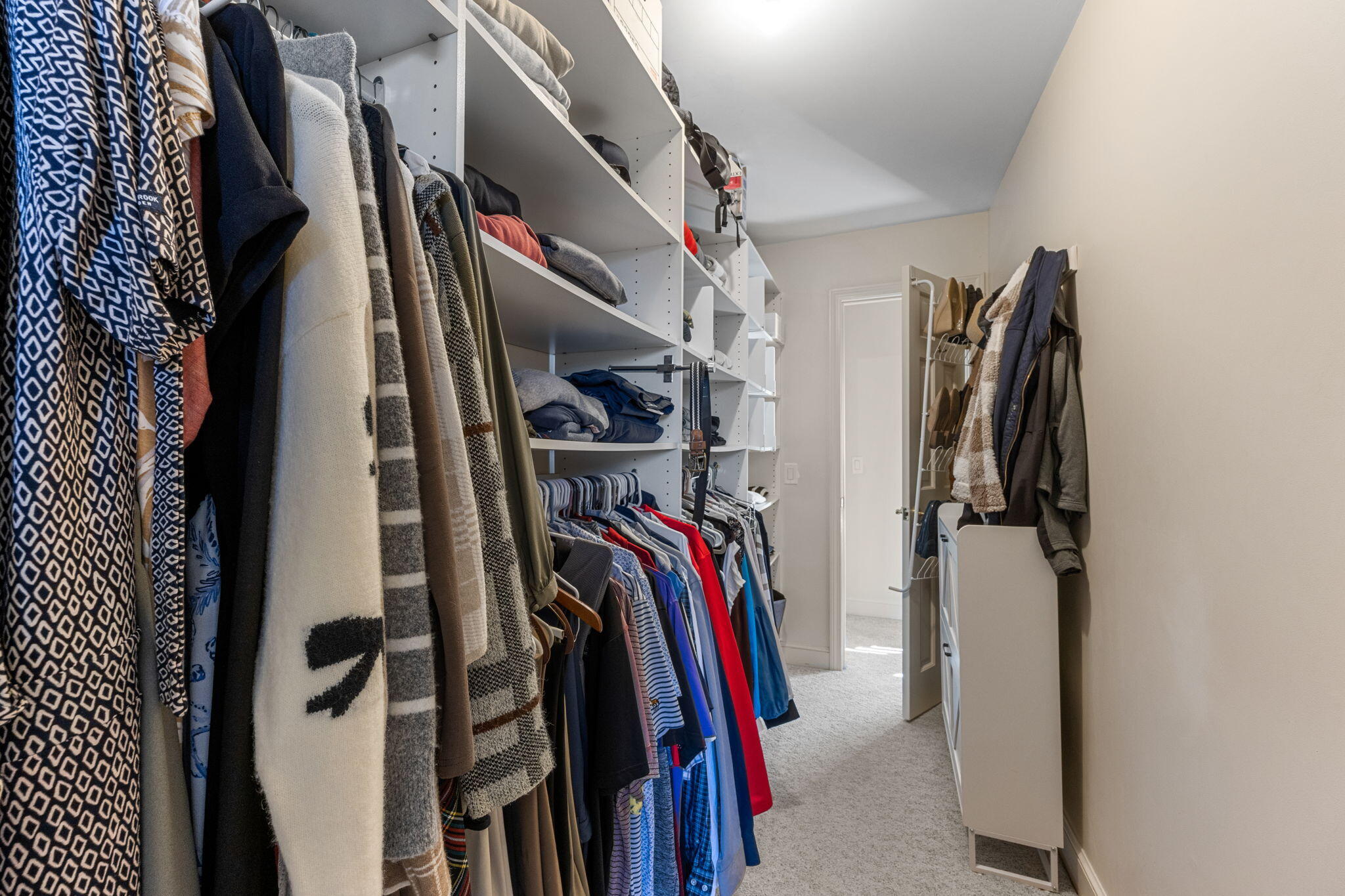 2 Dogwood Road, Unit 2 Buzzards Bay, MA 02532 - Photo 35 of 49 a view of walk in closet with clothes and shoes