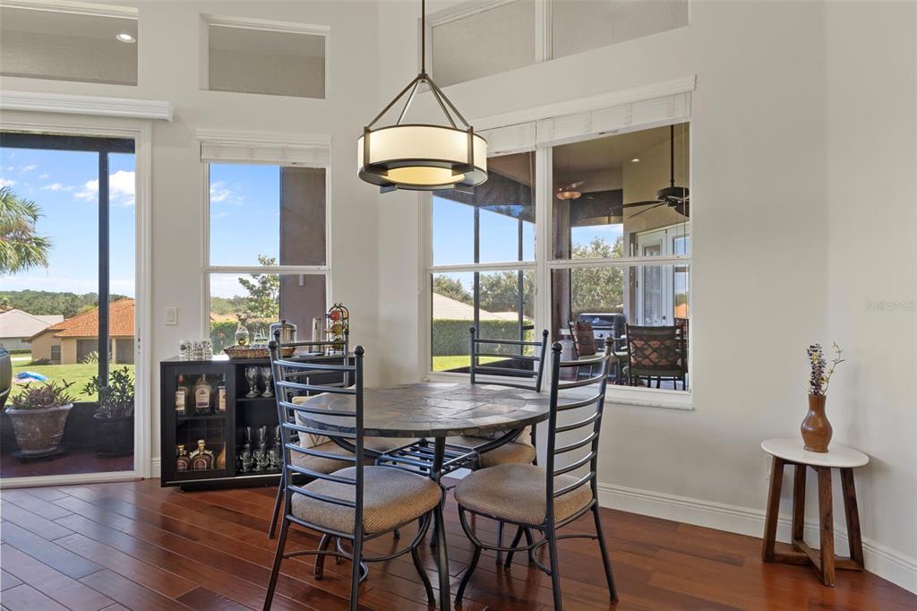 1601 North Tee Time Terrace Hernando, FL 34442 - Photo 30 of 69 a view of a dining room with furniture window and wooden floor