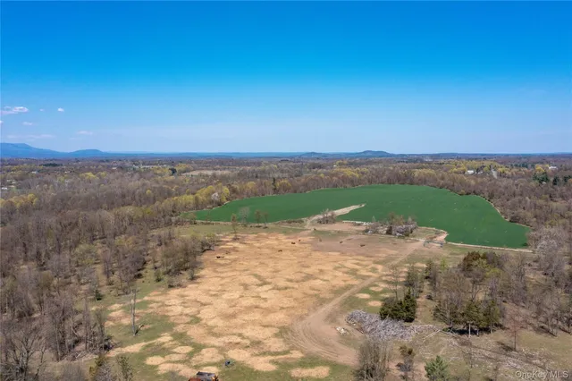 a view of a road with an ocean view