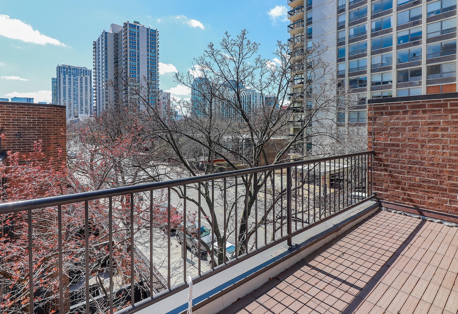 1346 North Sutton Place Chicago, IL 60610 - Photo 15 of 25 a view of balcony with wooden floor