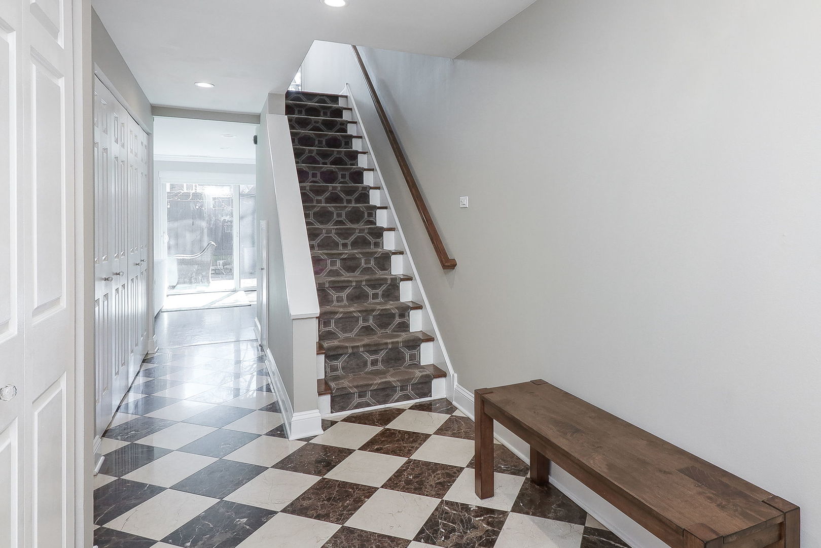 1346 North Sutton Place Chicago, IL 60610 - Photo 2 of 25 a view of a hallway with windows