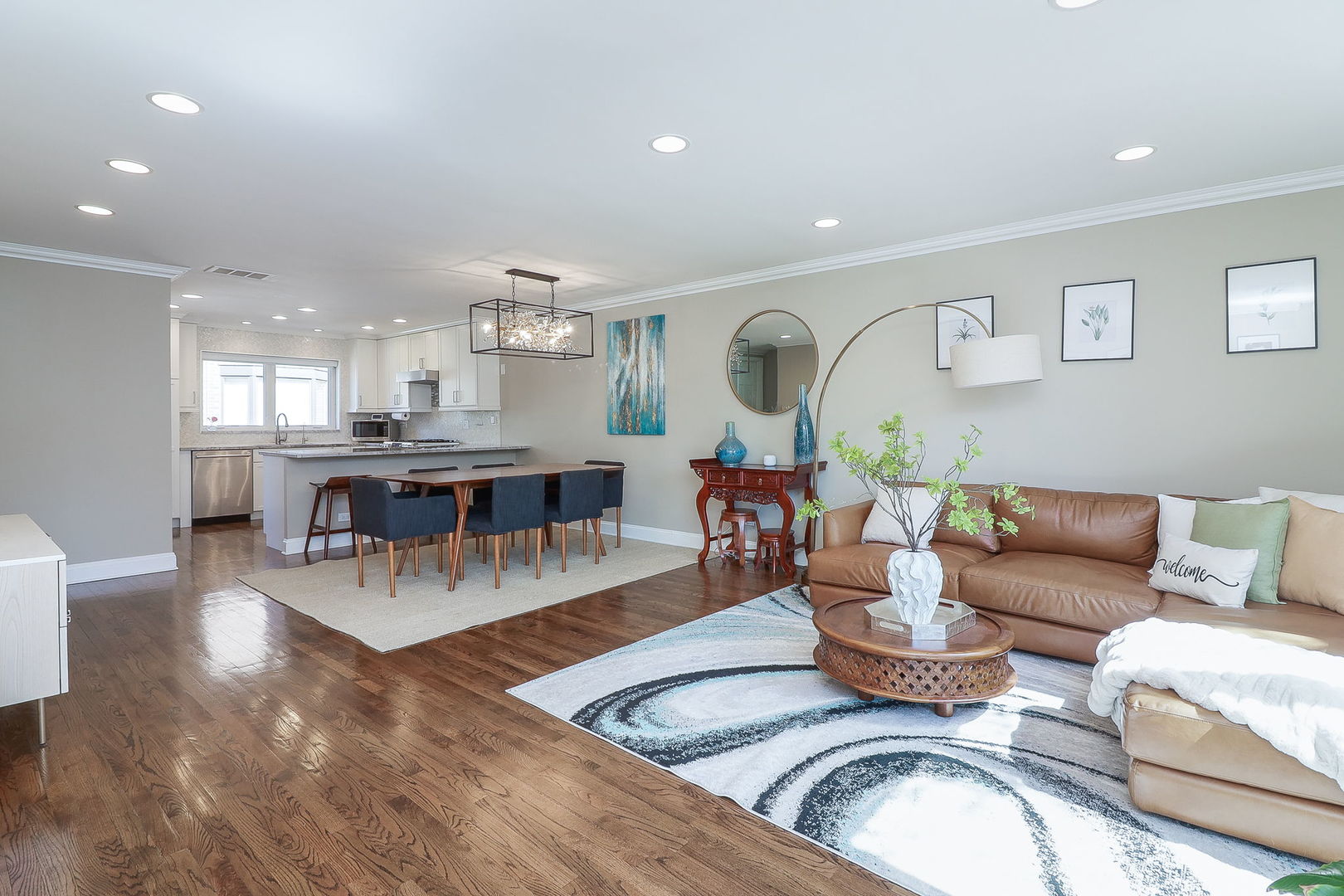1346 North Sutton Place Chicago, IL 60610 - Photo 3 of 25 a living room with furniture and kitchen view