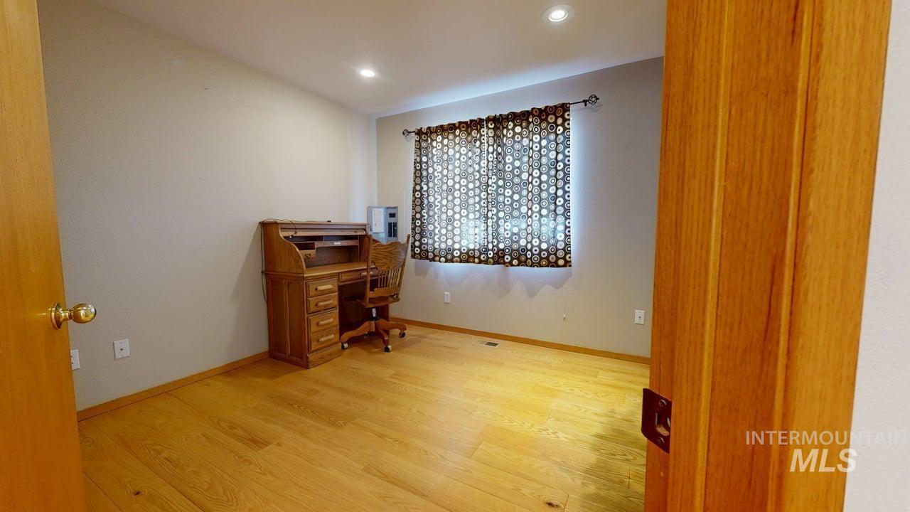 2794 9th Avenue Clarkston, WA 99403 - Photo 17 of 34 Home office featuring light wood-style flooring and recessed lighting